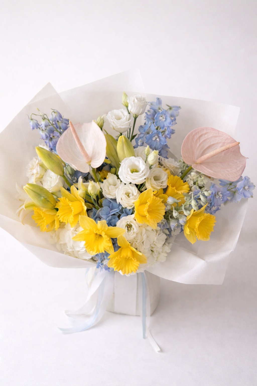 A refined Divine Bloom floral arrangement
